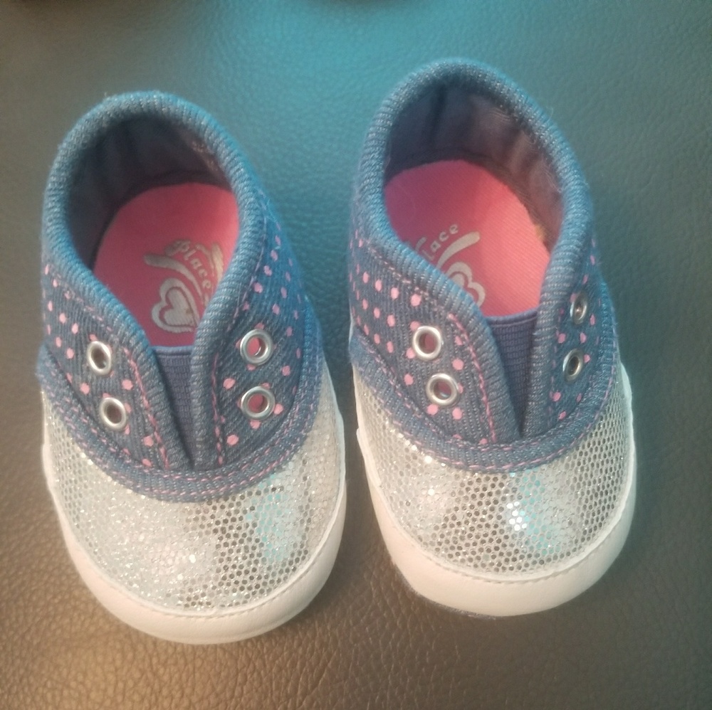 Children place sneakers